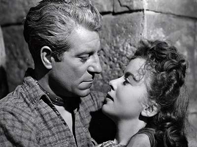Jean Gabin et Ida Lupino dans Moontide