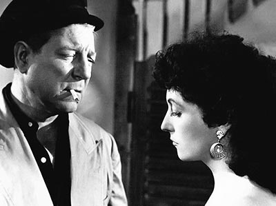 Jean Gabin et Mireille Ozy dans LE PORT DU DÉSIR réalisé par Edmond T. Gréville